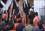 Violentos enfrentamientos entre trabajadores portuarios y policías en Atenas