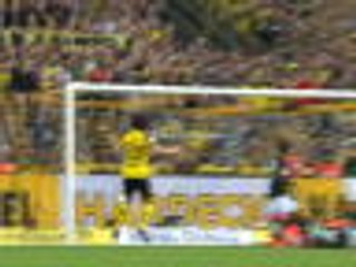 Late Alcacer brace sends Dortmund top