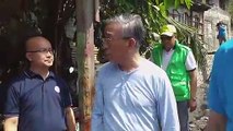 DENR officials inspect clogged waterways in Marikina