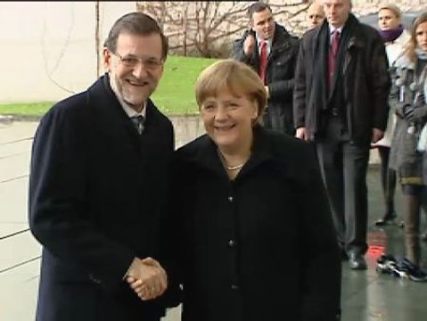 Rajoy mantiene su inocencia en Berlín