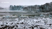 Moment massive glacier collapses in Iceland lagoon, sending tourists fleeing in panic