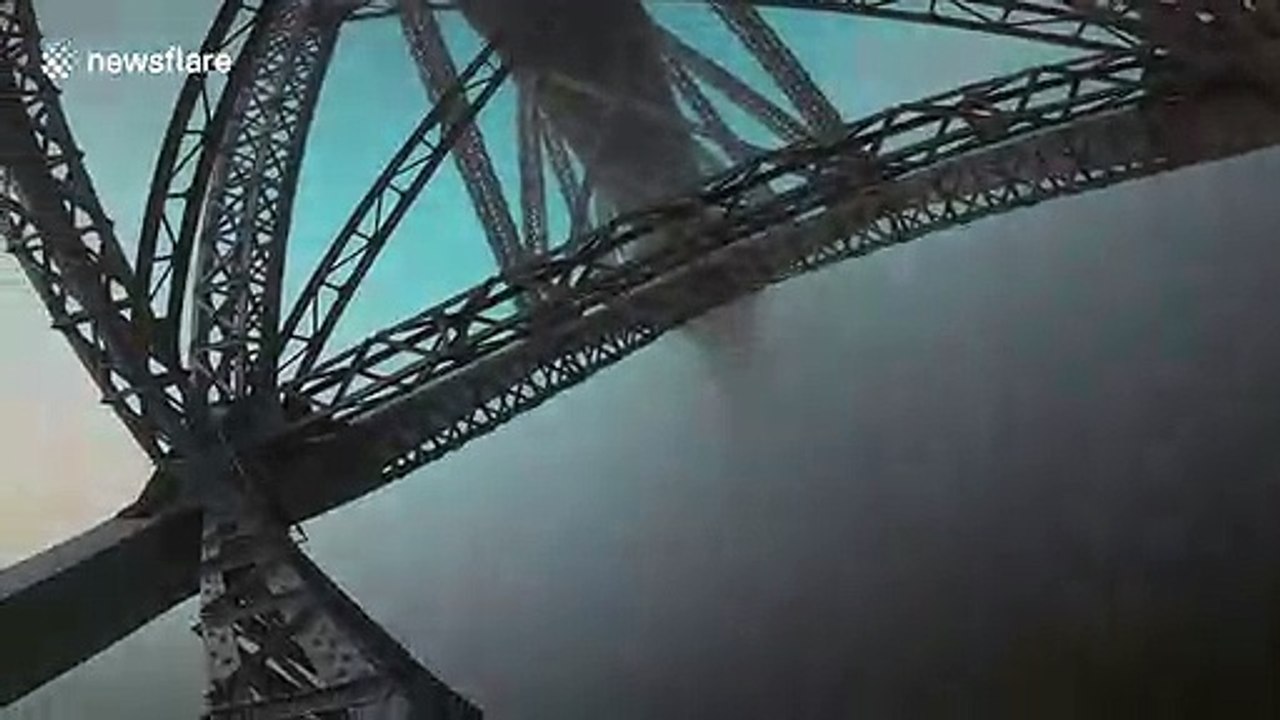 Fearless free-climber scales 'bridge over the clouds' in France