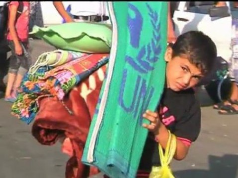 Los refugiados palestinos aprovechan el alto el fuego para volver a sus casas