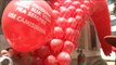 Brasil conmemora el Día Mundial del Sida soltado miles de globos rojos al cielo