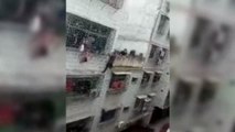 Rescatada una niña en China que se había quedado colgada de un balcón
