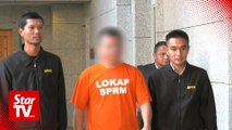 Minister's pol-sec remanded four days over RM28,000 watch probe