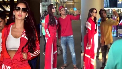 H0T Nora Fatehi's SWEET Gesture towards FANS Clicked Selfie with them - SPOTTED at Airport