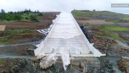 Water gushes down spillway of America's tallest dam for the 1st time in 2 years