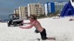 Man Pops Exercise Ball Attempting Gymnastics Flip on Beach