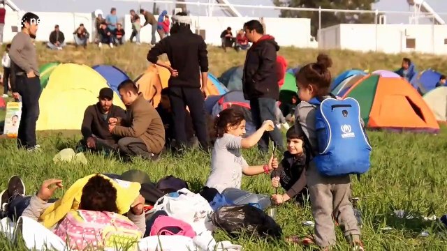 Hundreds of refugees descend on Greece's northern border with Macedonia to re-open migration route