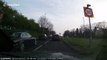 'What is he doing?' Moment impatient UK driver mounts grassy bank to avoid rush-hour traffic