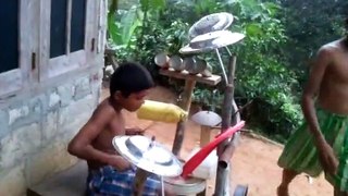 village dremer a little boy make his instrument in local way Comedy & Entertainment