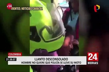 Colombia: hombre llora desconsolado por decomiso de mototaxi