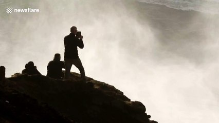 Surfer's massive wipeout followed by incredible jet ski rescue in Portugal