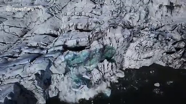 Tour guide's drone camera captures extraordinary moment Iceland glacier collapses into lake