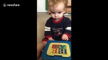 Baby gets scared of cuddly Jack-in-the-box surprise