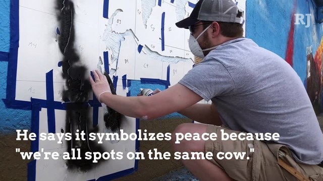 Two artists create a mural for peace in Las Vegas