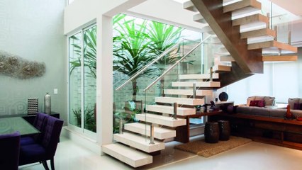 Drawing room designs with staircase design
