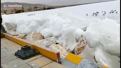 Spectacular video shows ice on Chinese lake spilling onto shore during melt