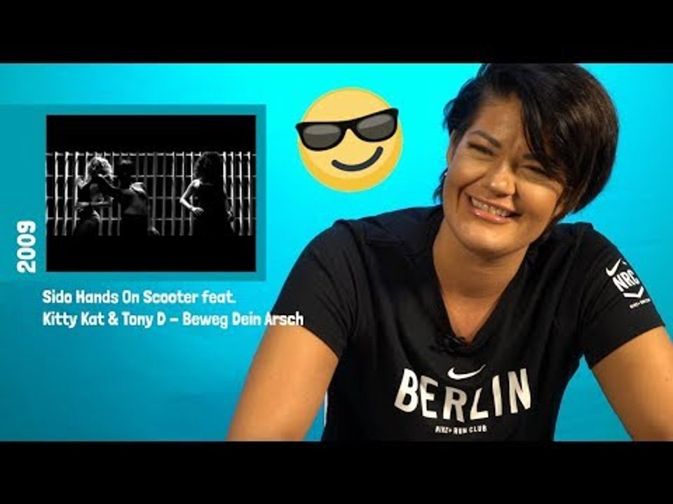 'Wie sehe ich aus?' So reagiert Kitty Kat auf ihre alten Musikvideos!