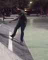 Skateboarder Attempting Trick Collides into Biker