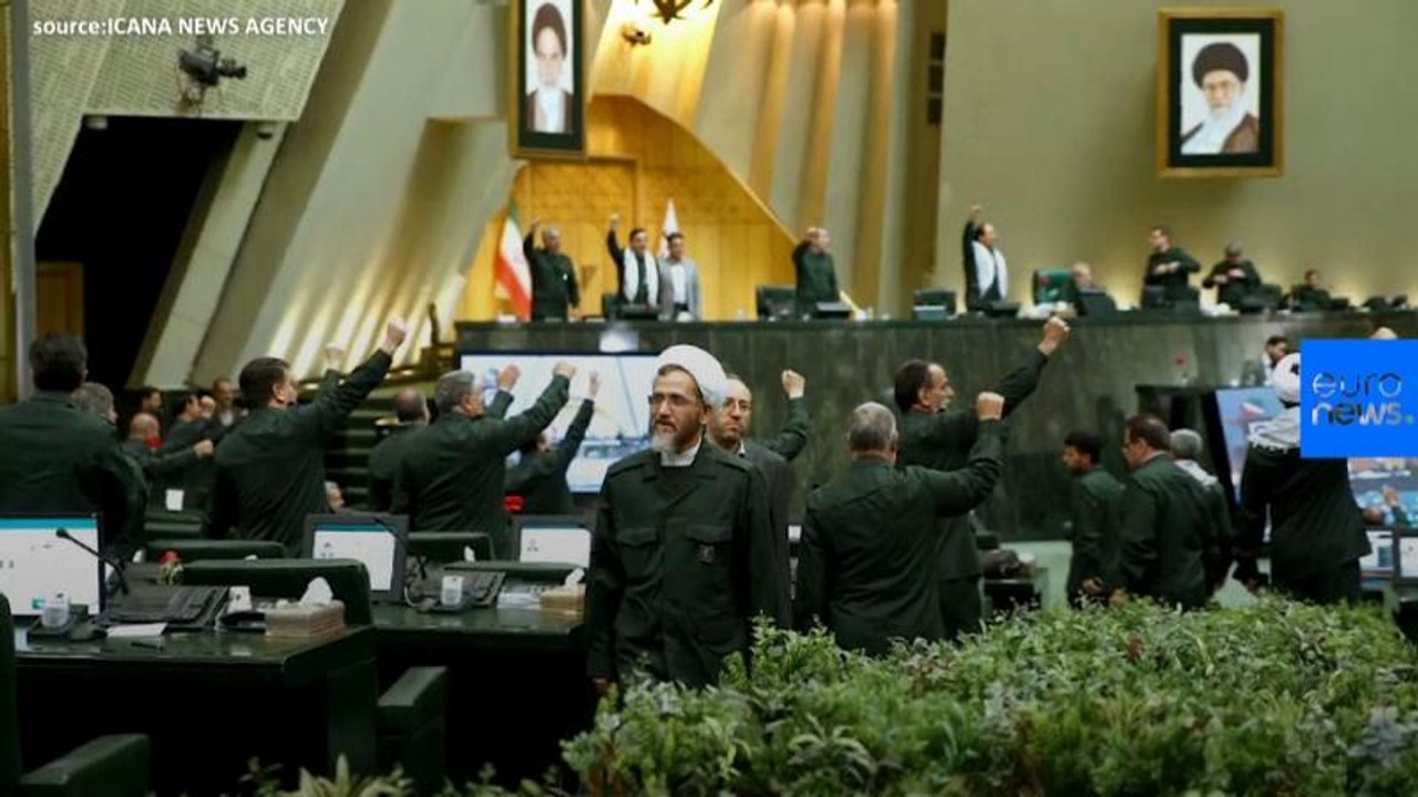 Watch: Iran's lawmakers wear Revolutionary Guar...