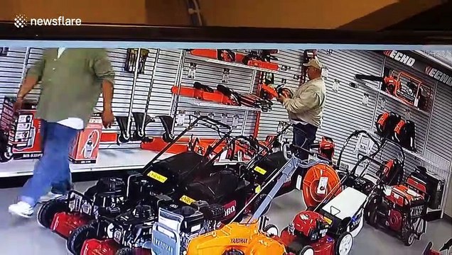 Shocking moment US man steals chainsaw by sticking it down his pants