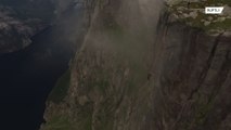 شاب يمشي على حبل معلق بين جبال النرويج !!!