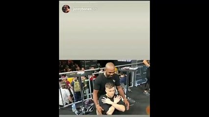 Jon "Bones" Jones puts a fan to sleep via rear naked choke.