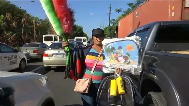 Watch: The Manila traffic vendors selling basketballs and bonsai trees