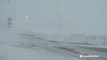 Blowing snow and strong winds create near whiteout conditions
