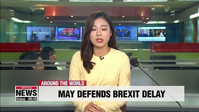 Theresa May defends Brexit delay amid calls for resignation