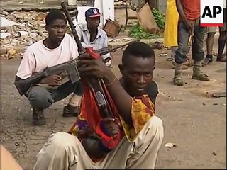 LIBERIA- FIGHTING CONTINUES AS cuộc chiến tại liberia bắn nhau ác liệt
