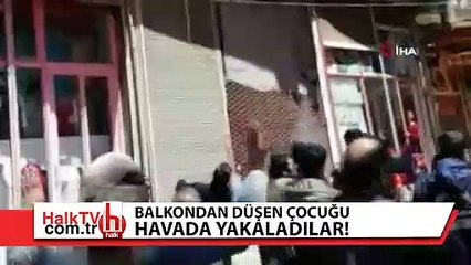 Balkondan düşen çocuğu havada yakaladılar! İşte o anlar