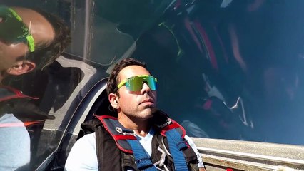 Stunt Pilot Snacks on Pizza