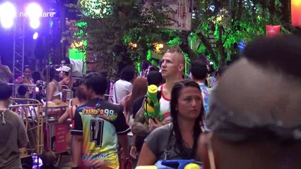 Thousands of tourists take part in 'world's biggest water fight' despite government ban