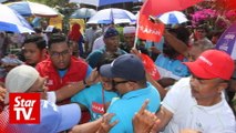 Shouting match outside Rantau by-election polling station