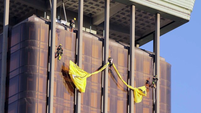 Acción de Greenpeace en Madrid para recordar a los candidatos a las elecciones el coste de la mala política ambiental