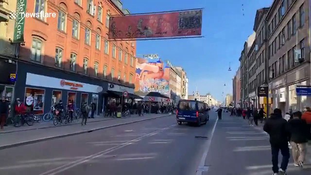 Angry demonstrators light fires on streets of Copenhagen