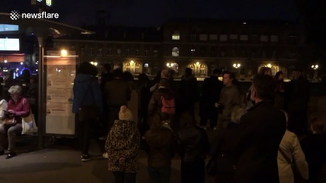 Crowd prays as Notre Dame Cathedral burns