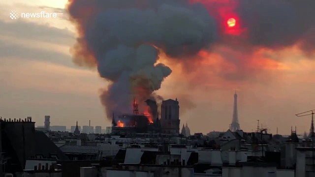 Moment part of Notre Dame spire collapses in Paris