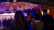 Parisians applaud firefighters following Notre Dame fire