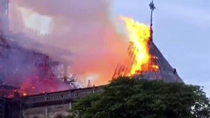 Notre-Dame: Fire under control as Macron pledges to rebuild