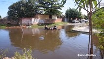 Boats used to get around as streets flood with feet of water