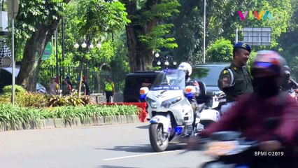 Presiden Jokowi Datangi TPS Ditemani Ibu Iriana