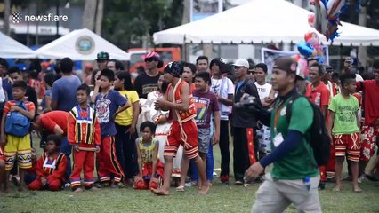 Bizarre race on stilts reaches new heights at hill tribe sports day in the Philippines