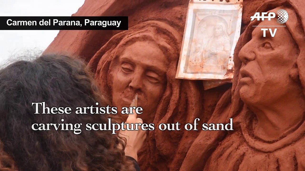 Paraguay: Artists work on sand sculptures for H...