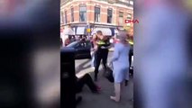 Hollanda polisinin başörtülü kadını tekmeleyip, yumrukladı