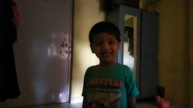 Little cutie enjoying at his own beat