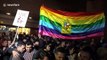 Colombians hold 'kiss-a-thon' to protest against homophobia in Bogotá shopping mall
